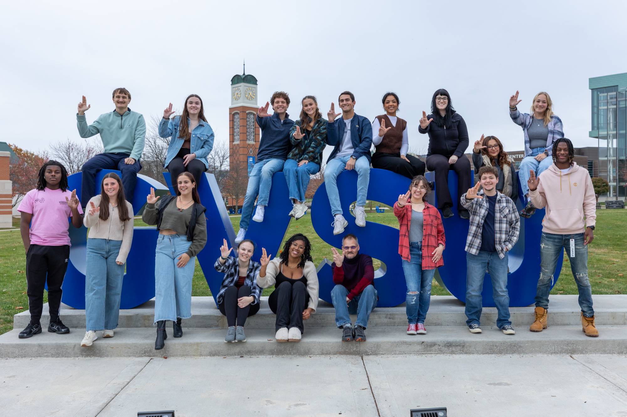 Student Senators "Anchoring-Up" on the GVSU sign on Allendale campus.